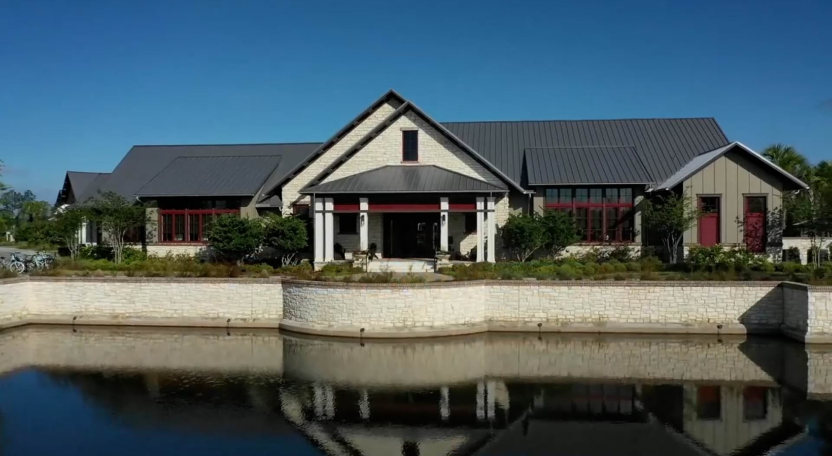 a building in front of a body of water